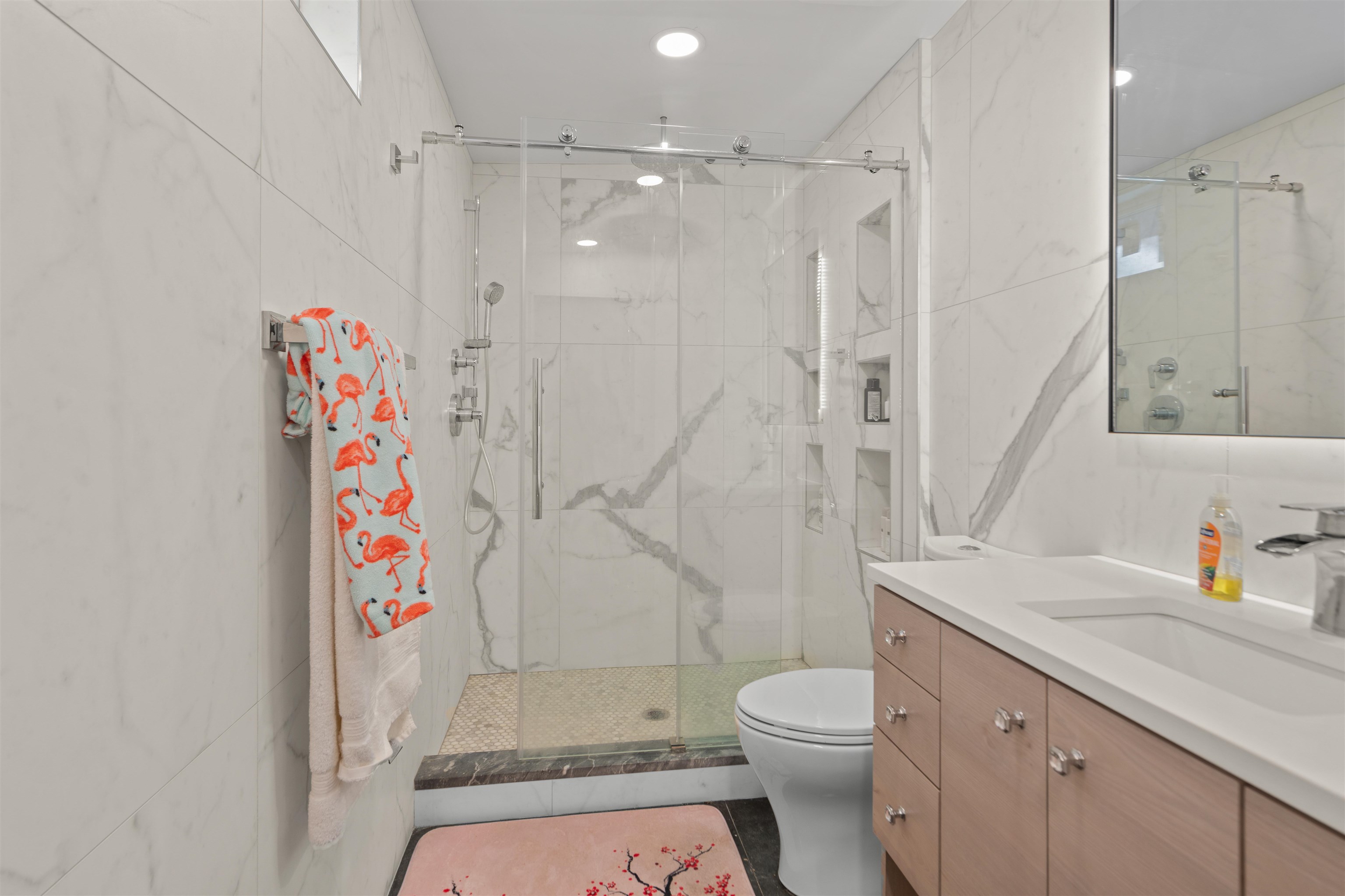 9009 Riverside Place, Unit 3 North Bergen, NJ 07047 - Photo 8 of 18 a bathroom with a sink toilet and shower