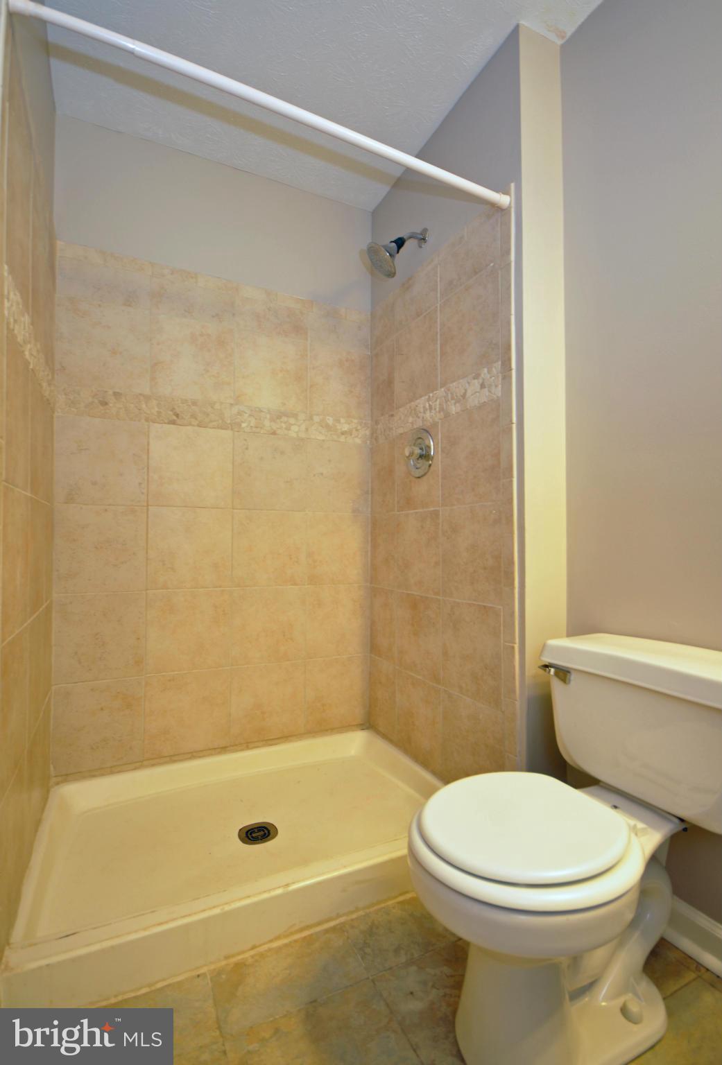 5413 Canonbury Road Baltimore, MD 21237 - Photo 22 of 30 Lower Level Full Bath with Tiled Shower