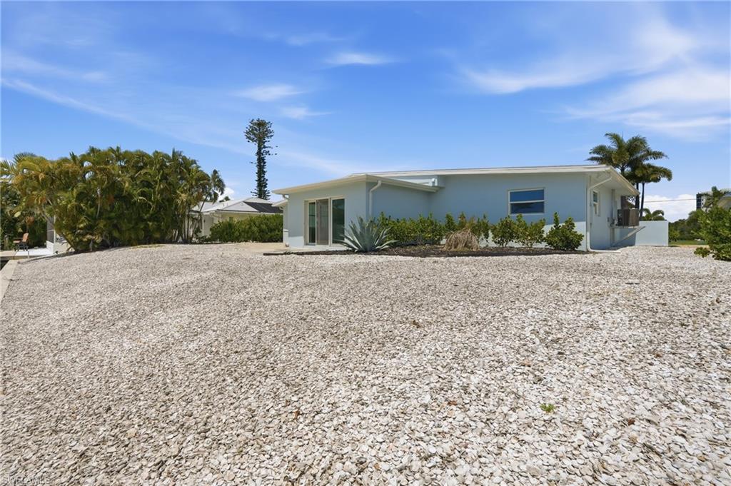 8336 Lagoon Road Fort Myers Beach, FL 33931 - Photo 30 of 50 front of the home- Virtually Edited Image