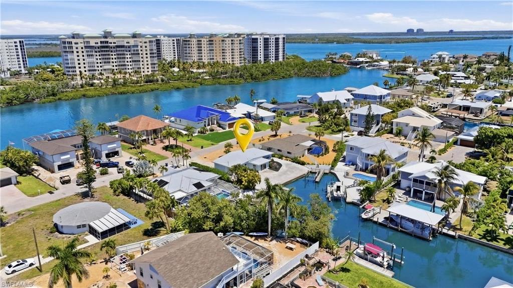 8336 Lagoon Road Fort Myers Beach, FL 33931 - Photo 42 of 50 Aerial view of the property, located on a canal with direct water access - Virtually Edited Image