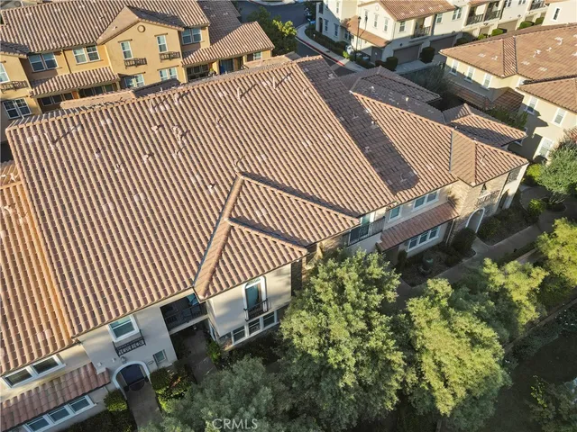 an aerial view of residential building with parking space