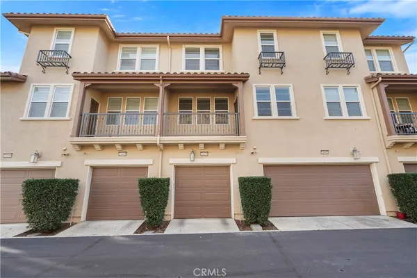 a view of a brick building from a balcony