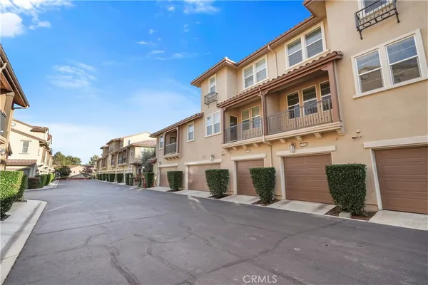 a room with a window and a toilet