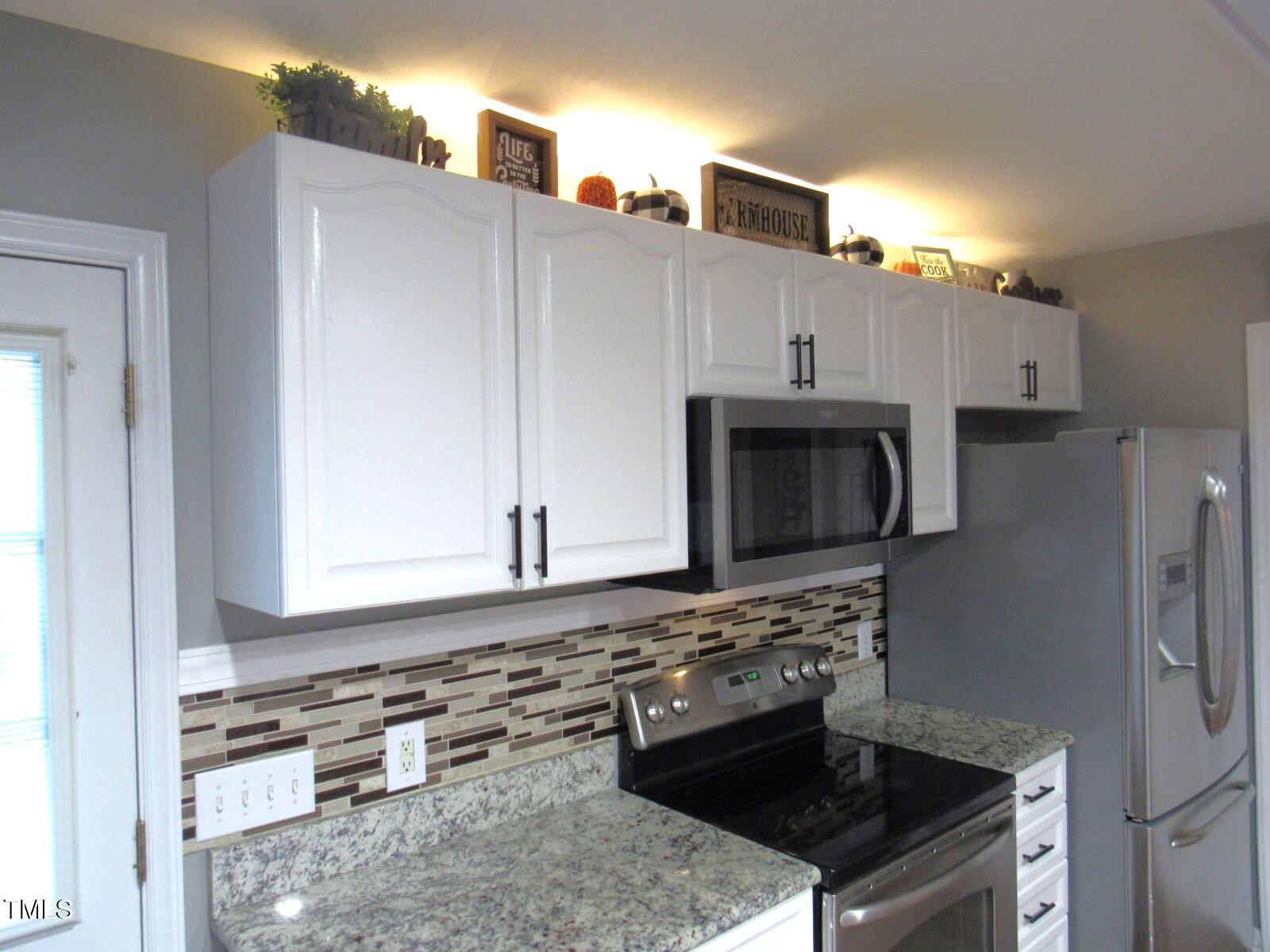 3214 Tump Wilkins Road Stem, NC 27581 - Photo 25 of 90 Kitchen