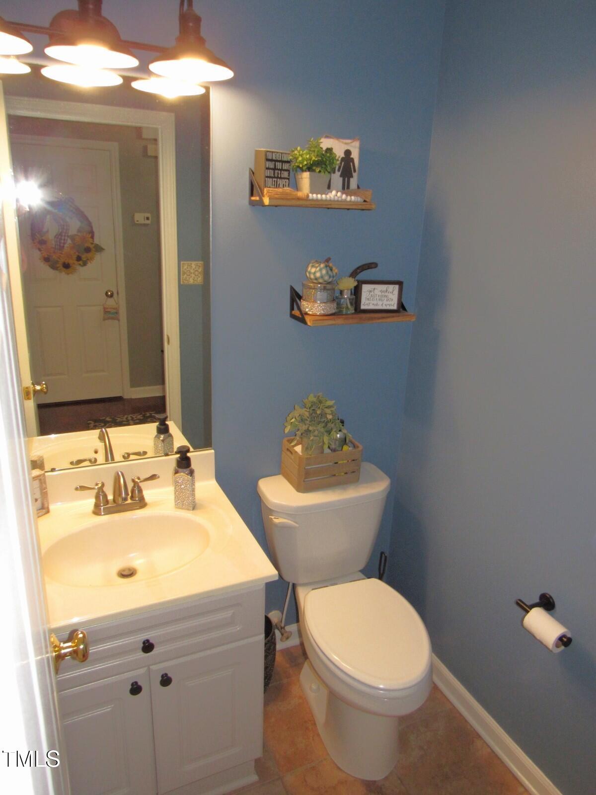 3214 Tump Wilkins Road Stem, NC 27581 - Photo 35 of 90 Half bath