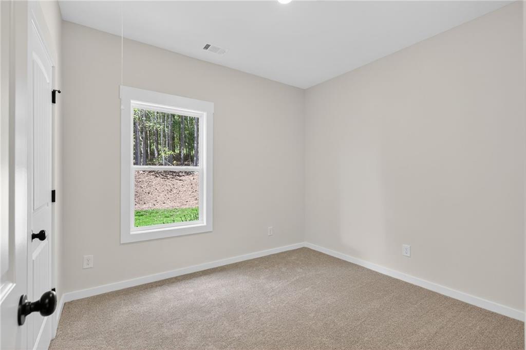 5534 Steadman Road Buchanan, GA 30113 - Photo 24 of 40 an empty room with a window