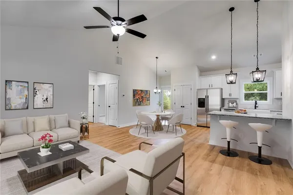 a living room with furniture and a table