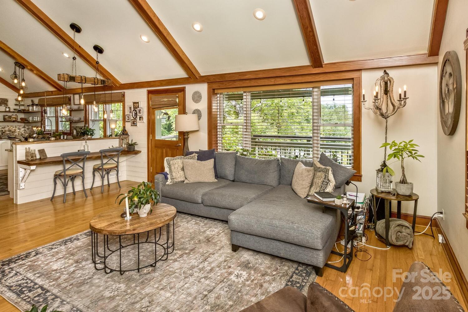 25 View Ridge Parkway Leicester, NC 28748 - Photo 14 of 47 a living room with furniture and a large window