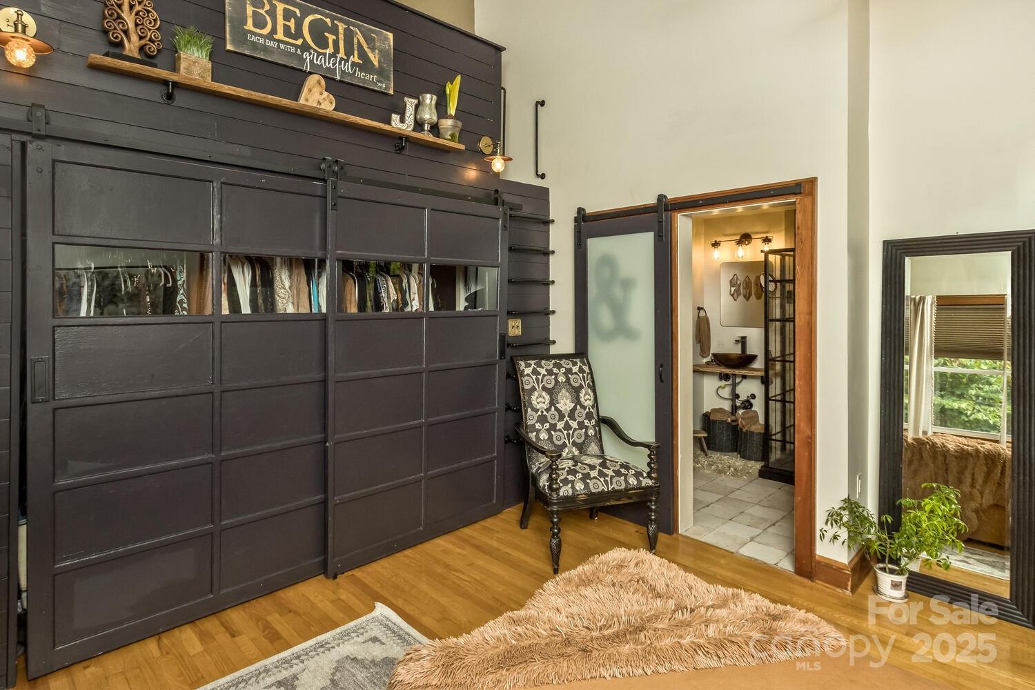 25 View Ridge Parkway Leicester, NC 28748 - Photo 19 of 47 a view of a door and chair in the front of a building