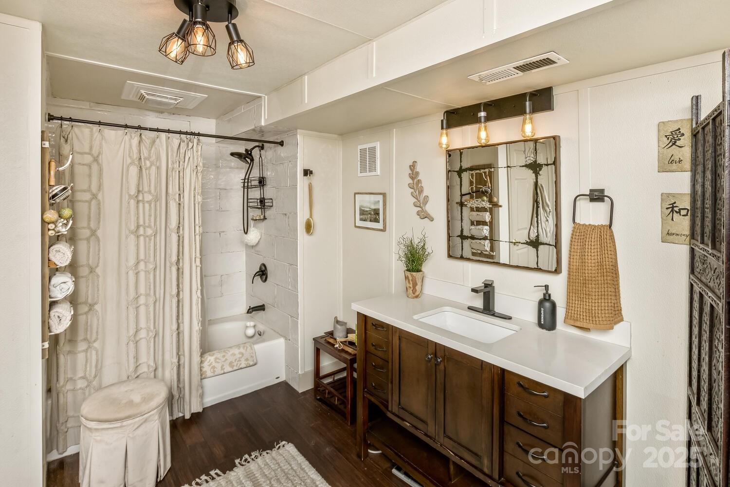 25 View Ridge Parkway Leicester, NC 28748 - Photo 22 of 47 a bathroom with a sink a toilet and shower