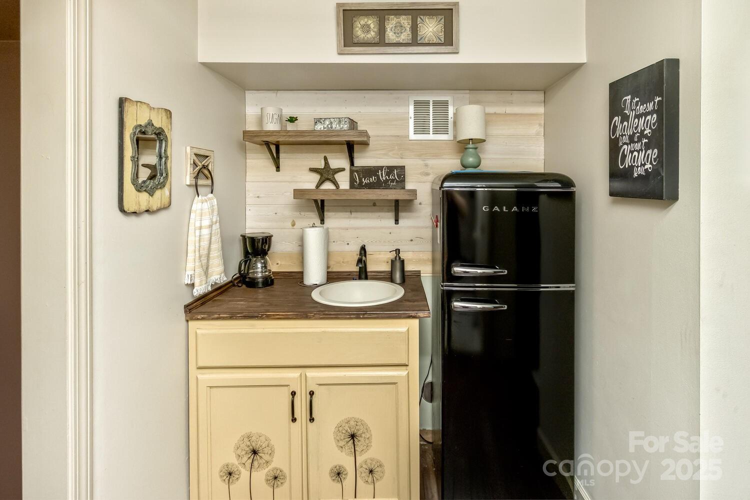 25 View Ridge Parkway Leicester, NC 28748 - Photo 28 of 47 a kitchen with a refrigerator and cabinets