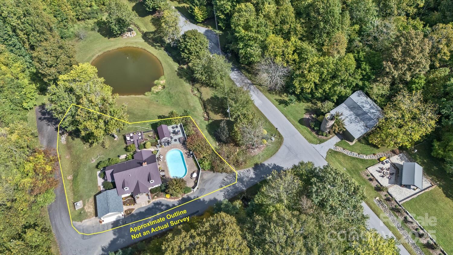 25 View Ridge Parkway Leicester, NC 28748 - Photo 36 of 47 an aerial view of a house with a yard and swimming pool