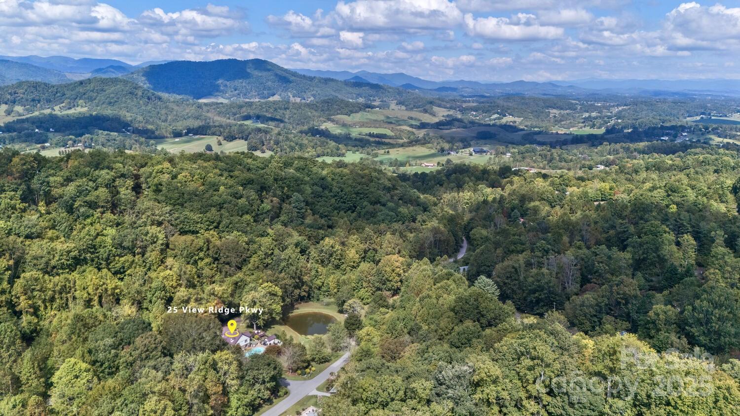 25 View Ridge Parkway Leicester, NC 28748 - Photo 39 of 47 a view of a city with mountains in the background
