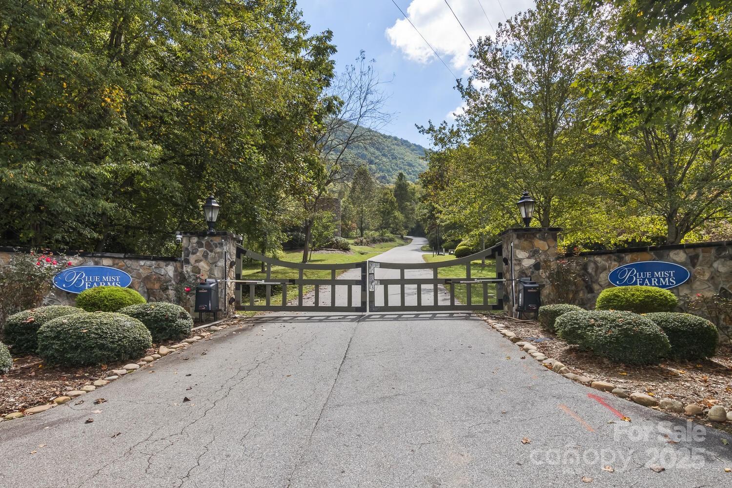 25 View Ridge Parkway Leicester, NC 28748 - Photo 41 of 47 a view of a bench with wooden fence