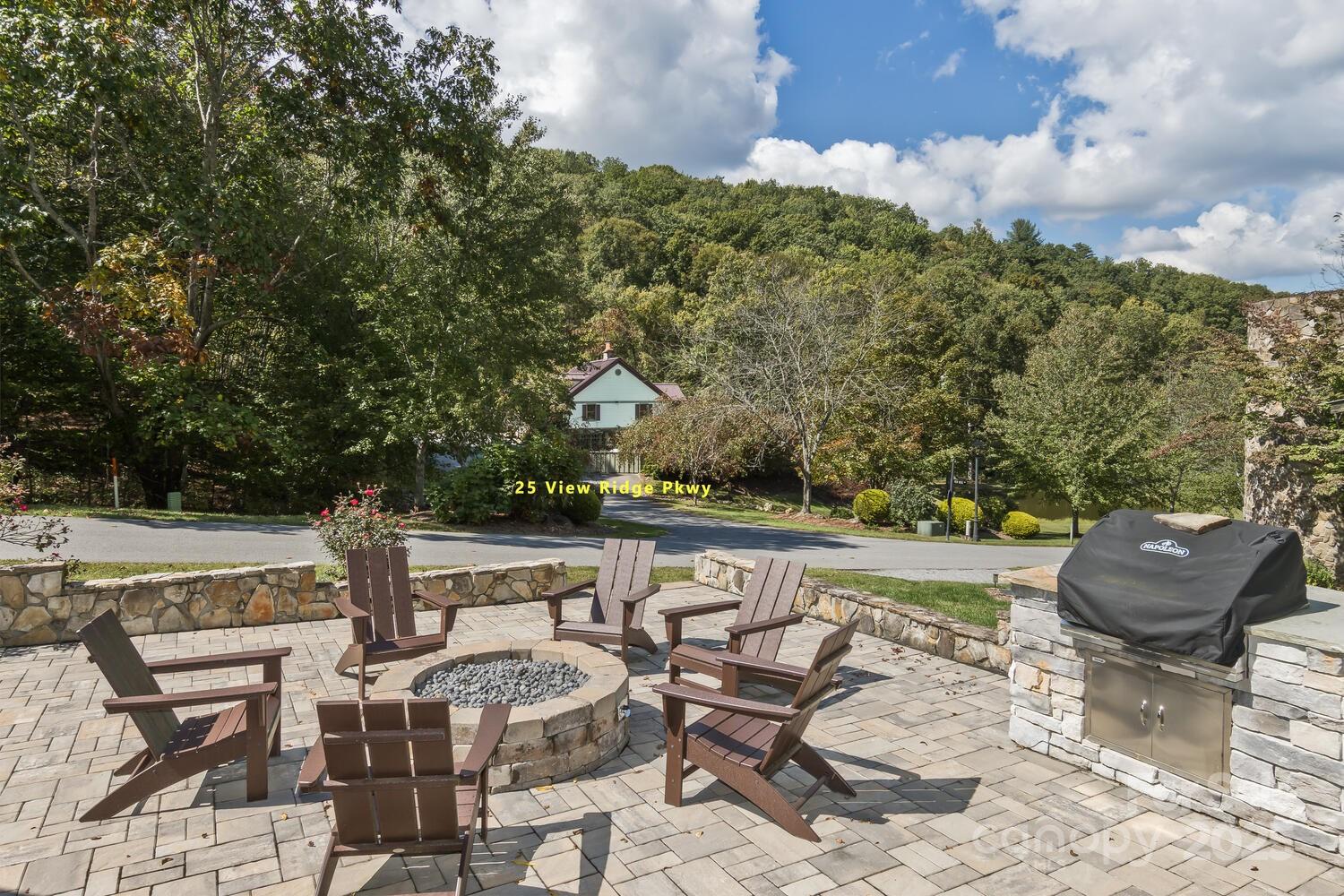 25 View Ridge Parkway Leicester, NC 28748 - Photo 44 of 47 a view of a chairs and table in the patio