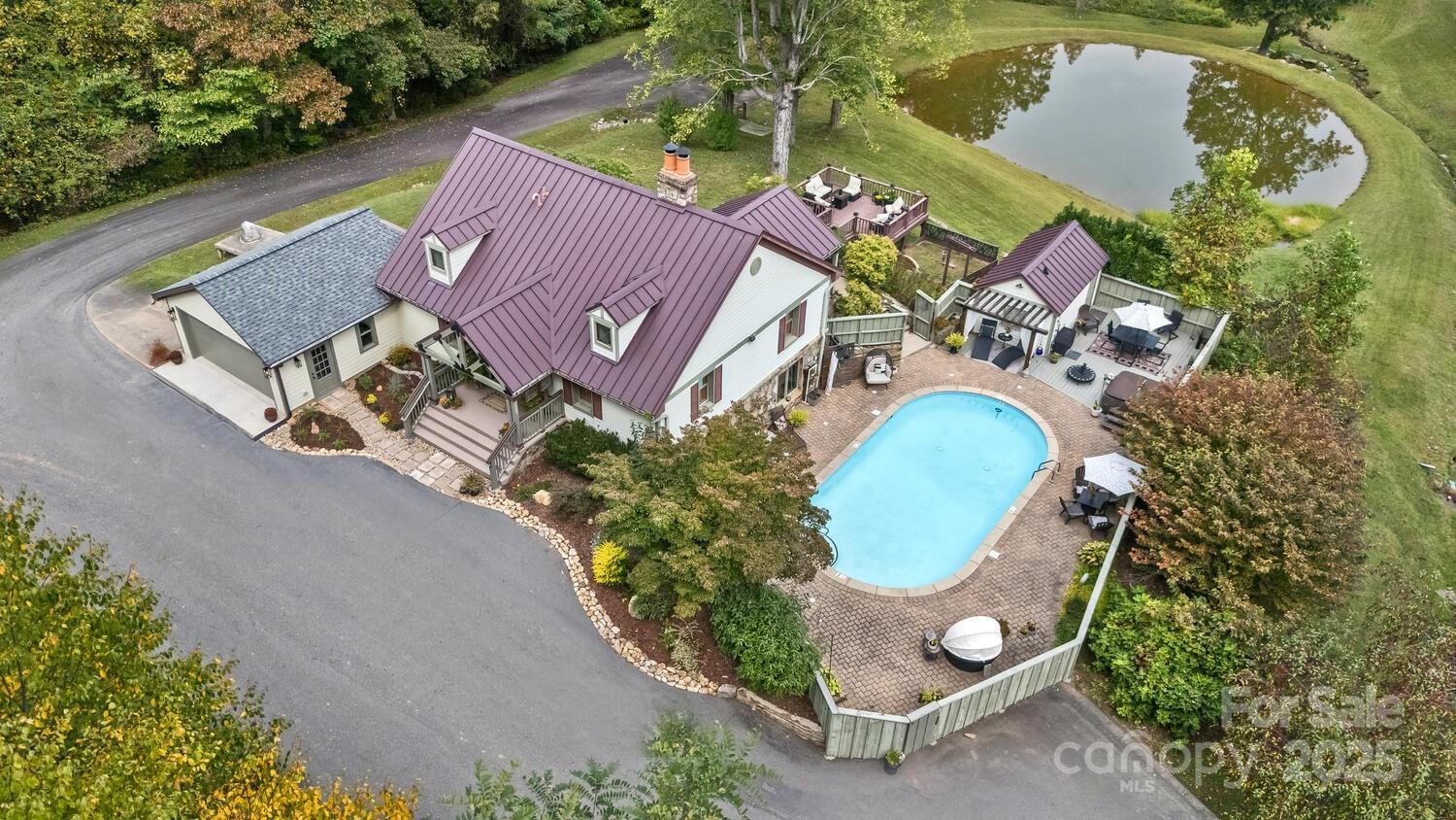 25 View Ridge Parkway Leicester, NC 28748 - Photo 6 of 47 an aerial view of a house with garden space and street view