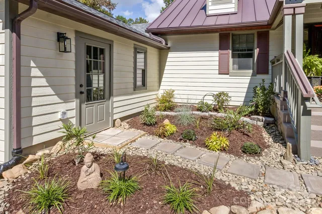 a view of balcony with furniture