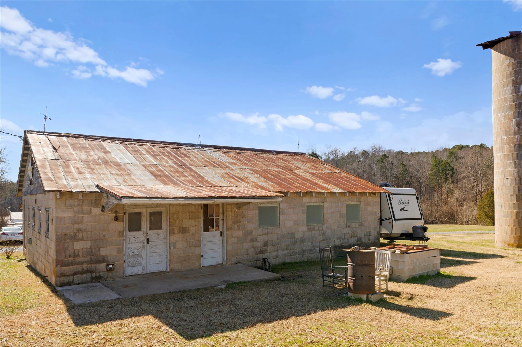 4121 Windy Road Concord, NC 28027 - Photo 19 of 22 a front view of a house with a yard