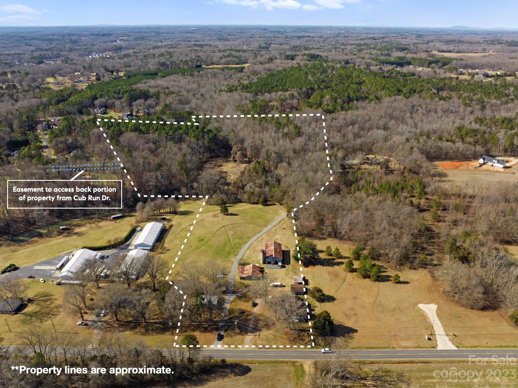 4121 Windy Road Concord, NC 28027 - Photo 2 of 22 an aerial view of residential houses with outdoor space
