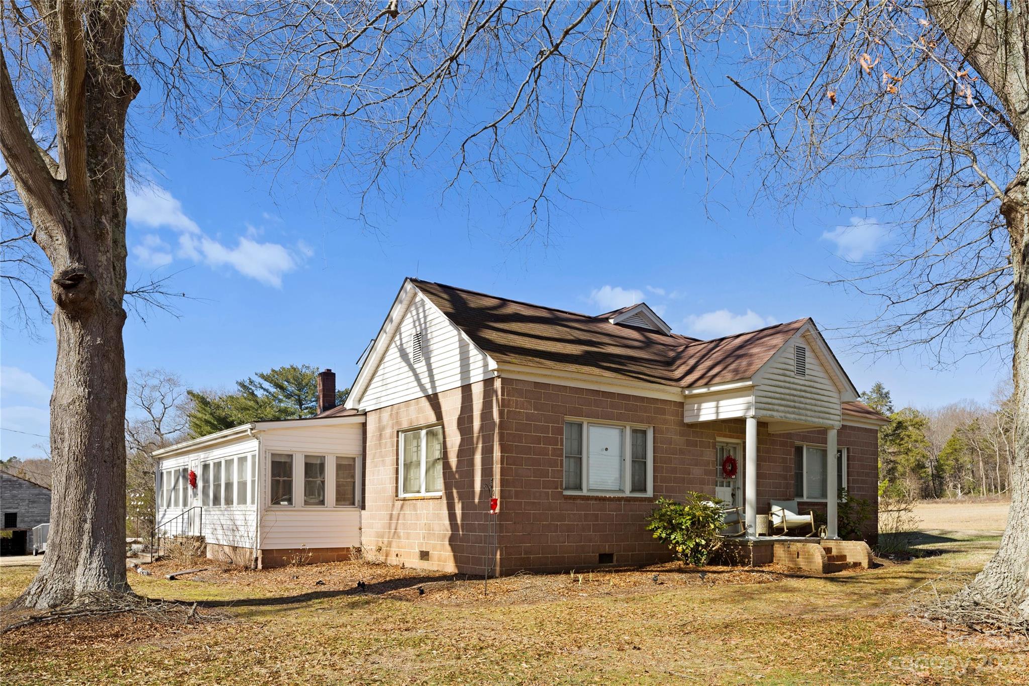 4121 Windy Road Concord, NC 28027 - Photo 6 of 22 a front view of a house with a porch