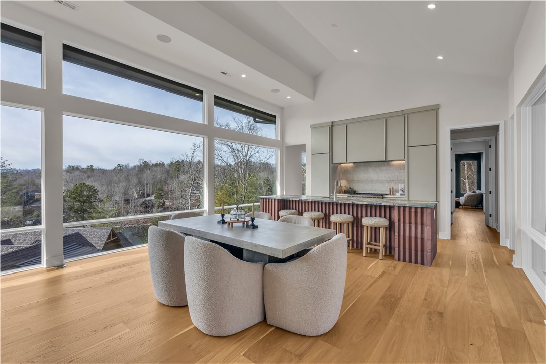 127 Crosswind Court Sunset, SC 29685 - Photo 10 of 49 This bright interior features wide plank wood flooring and expansive windows with captivating views.