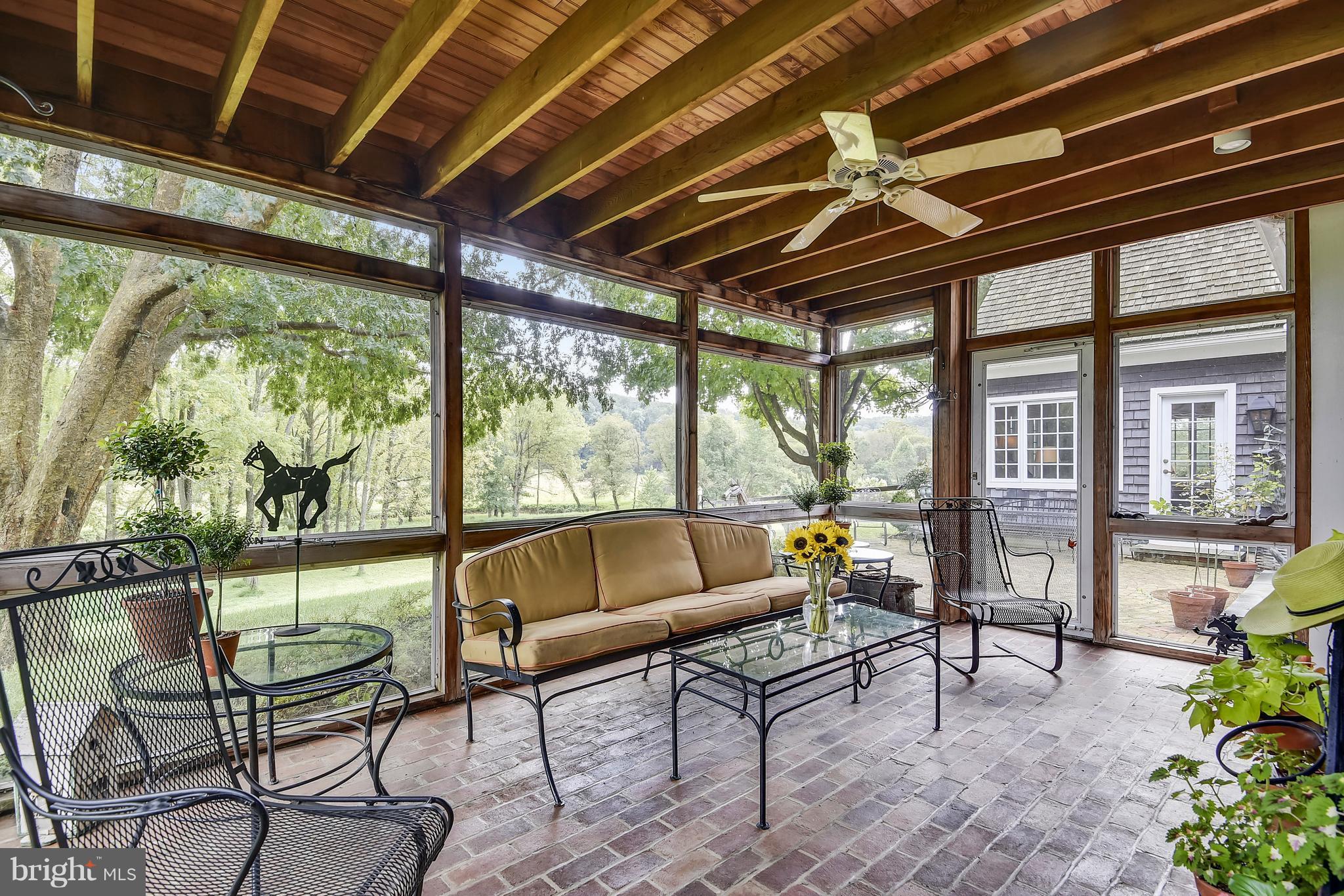 3741 Butler Road Glyndon, MD 21136 - Photo 10 of 28 Screened-in porch over looking black walnut grove