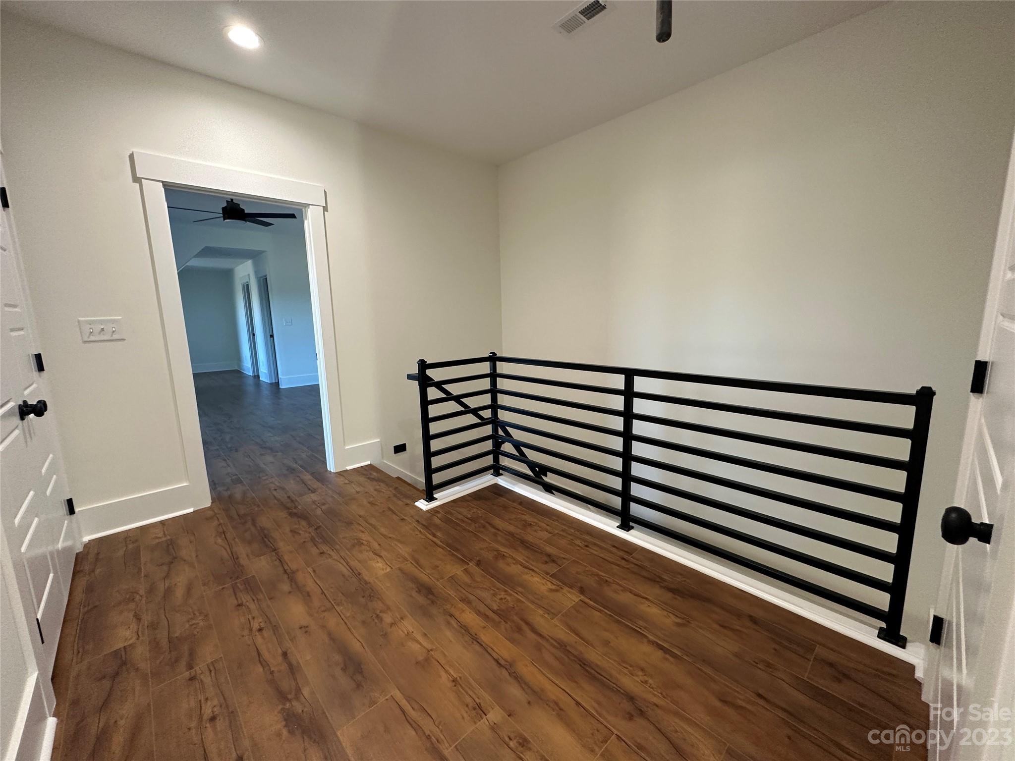 208 Beth Haven Church Road Denver, NC 28037 - Photo 23 of 29 a view of a room with wooden floor