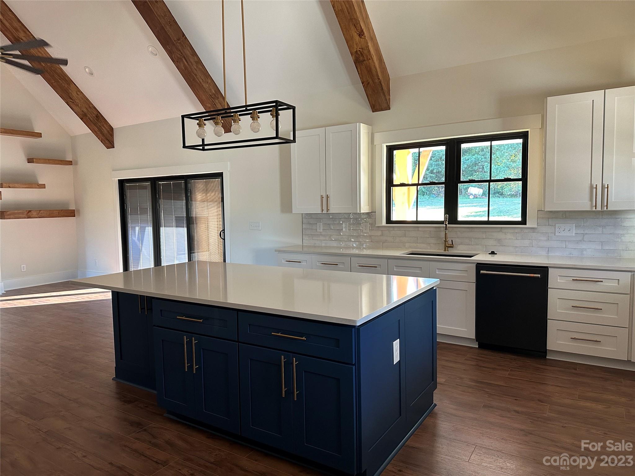 208 Beth Haven Church Road Denver, NC 28037 - Photo 5 of 29 a kitchen with stainless steel appliances granite countertop a sink and wooden floors