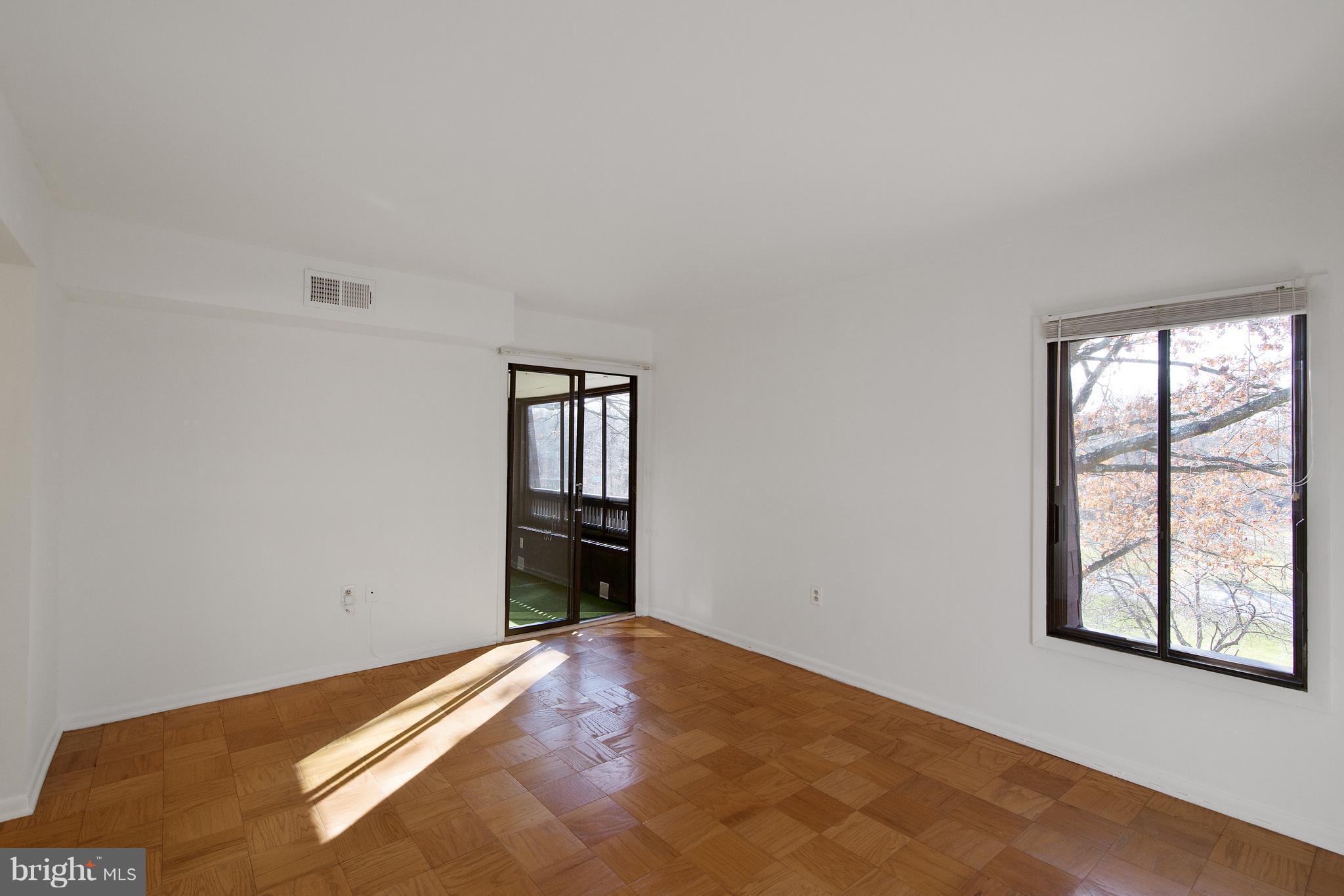 5253 West Running Brook Road, Unit 302 Columbia, MD 21044 - Photo 17 of 30 Slider to Sunroom