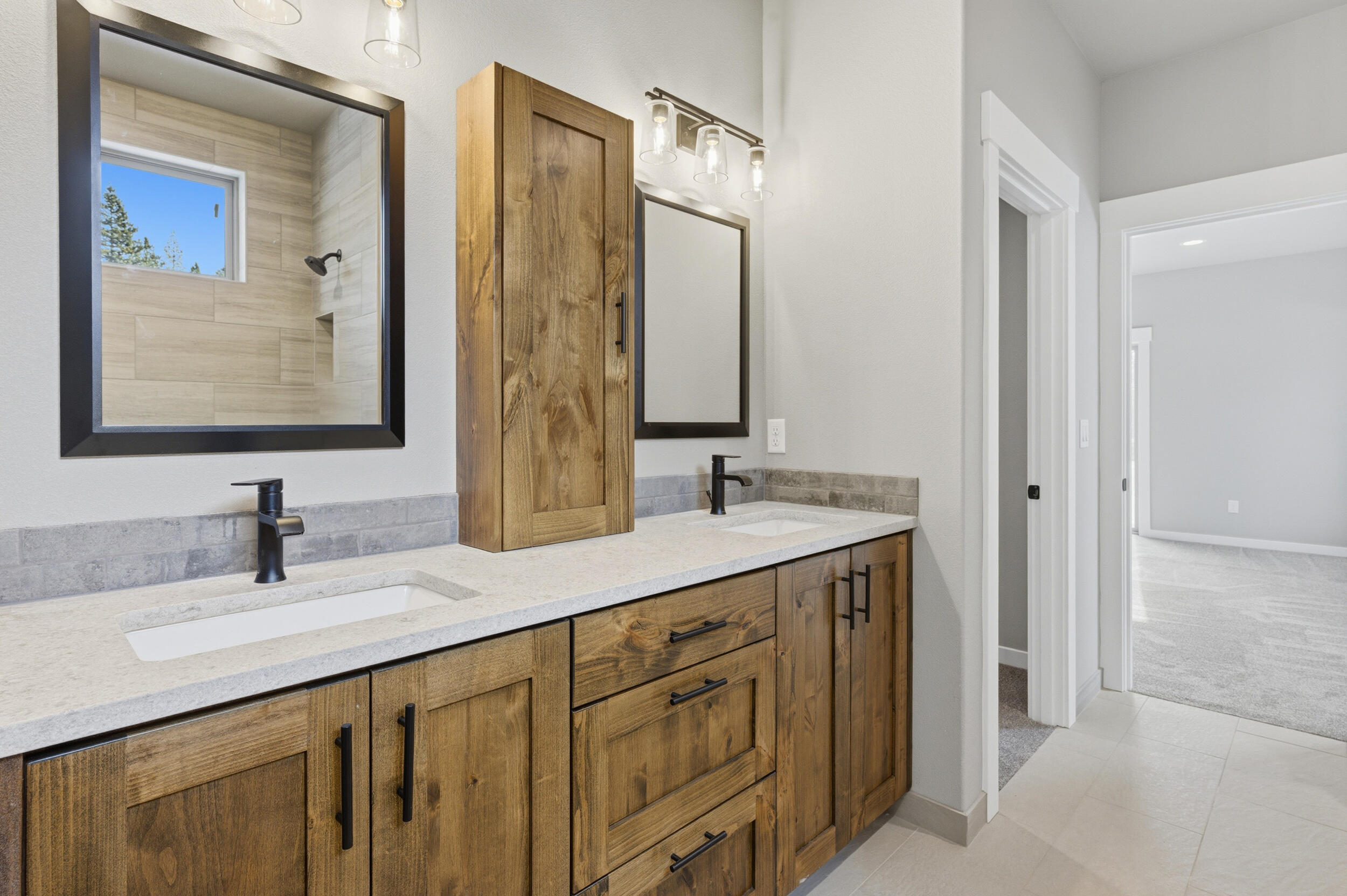 16083 Dyke Road, Unit 9 La Pine, OR 97739 - Photo 27 of 53 a bathroom with a sink double vanity and a mirror