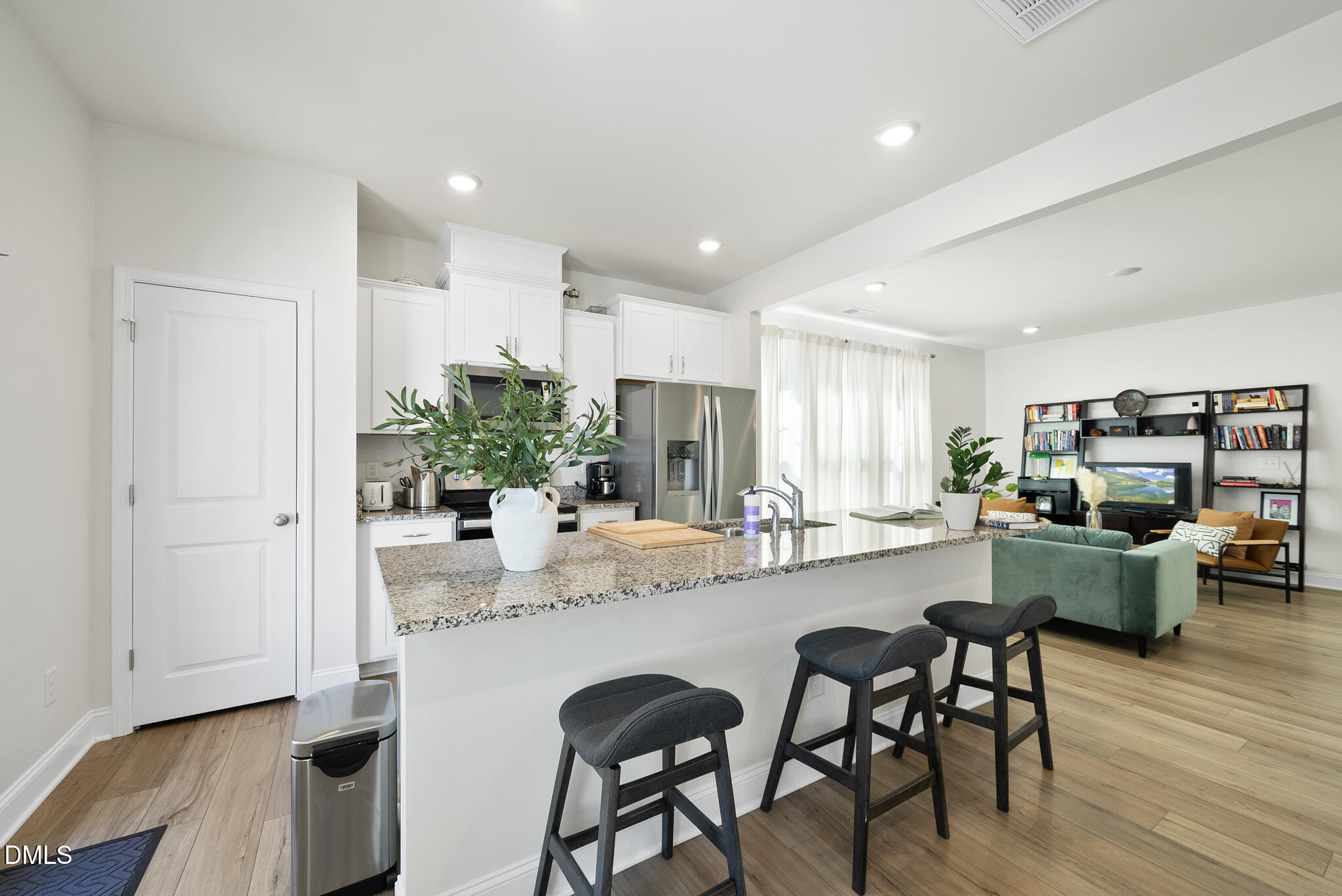 53 Bibury Way Angier, NC 27501 - Photo 13 of 50 a kitchen with sink table and chairs