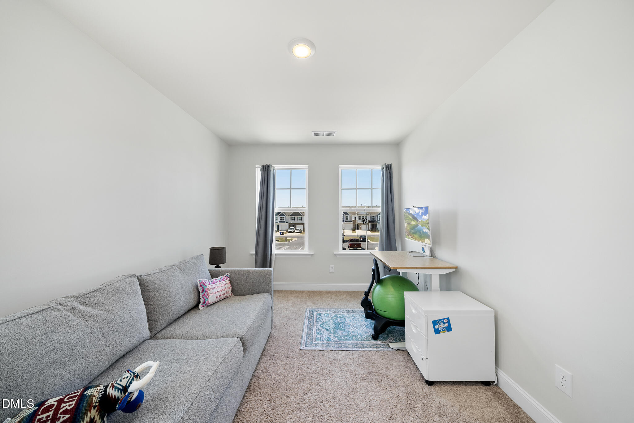 53 Bibury Way Angier, NC 27501 - Photo 21 of 50 a living room with furniture and a window