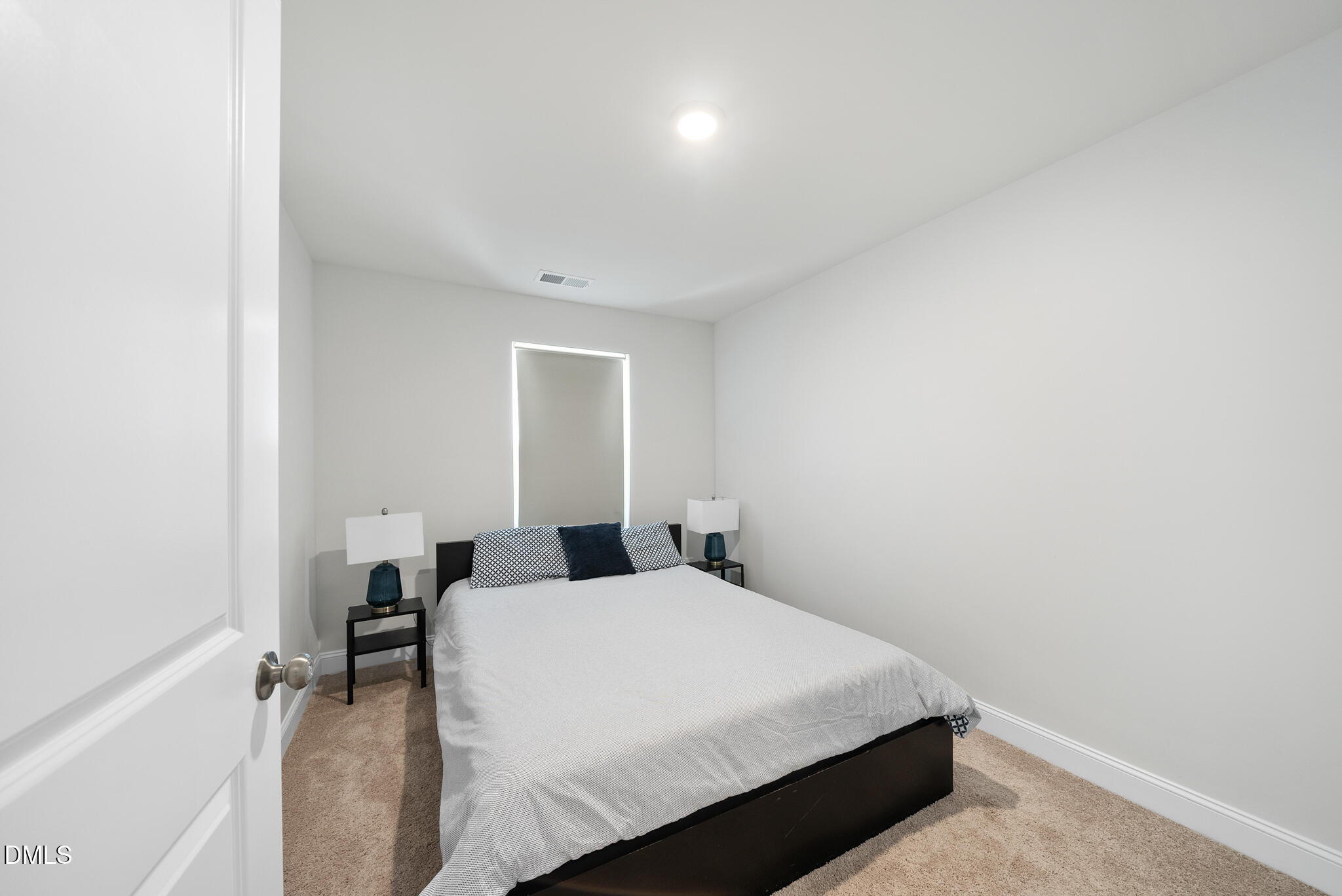 53 Bibury Way Angier, NC 27501 - Photo 22 of 50 a bedroom with a bed and a table
