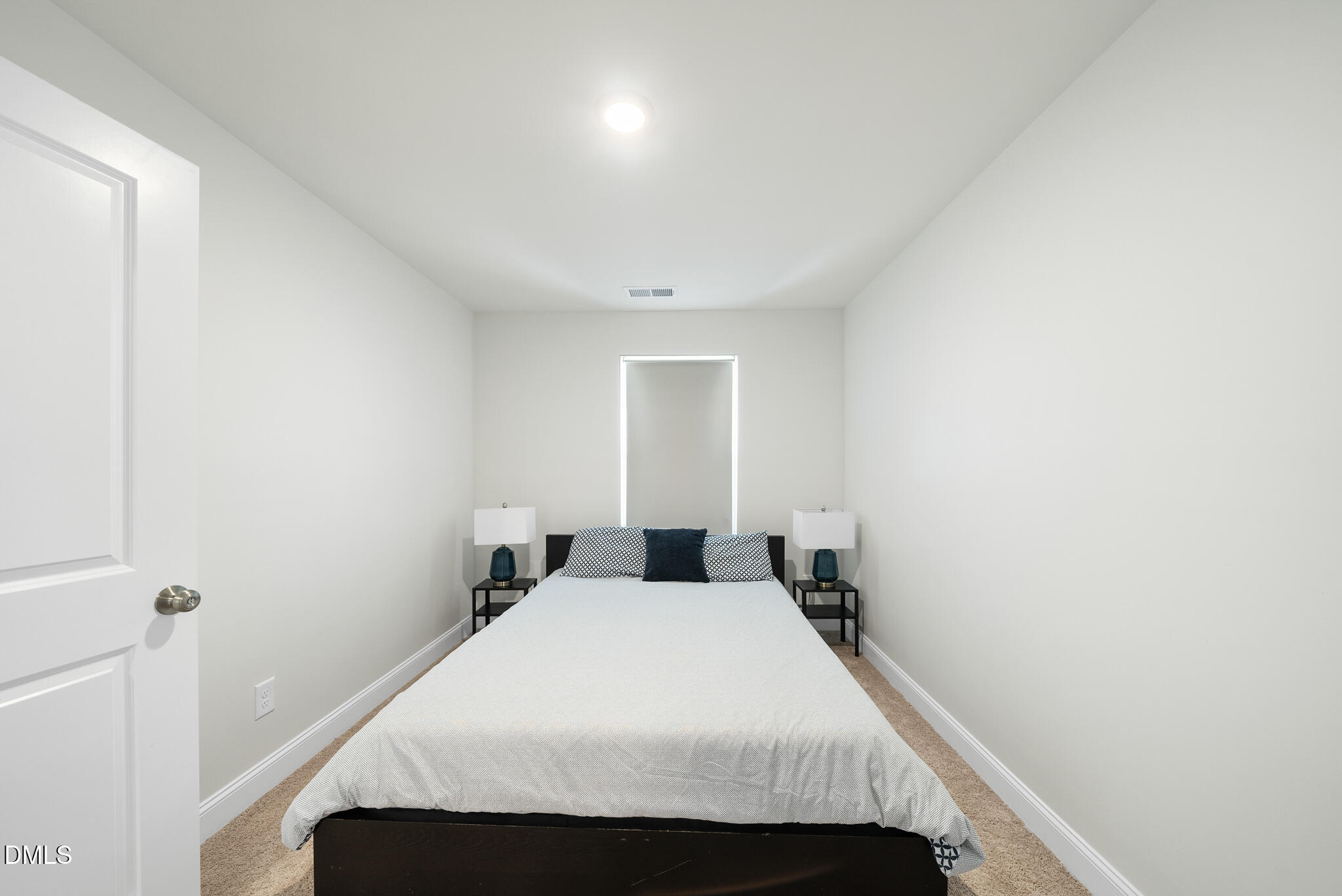 53 Bibury Way Angier, NC 27501 - Photo 23 of 50 a bedroom with a bed and a window
