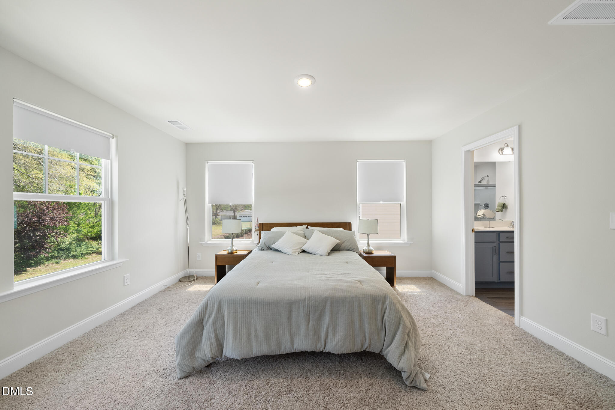 53 Bibury Way Angier, NC 27501 - Photo 25 of 50 a bedroom with a large bed and a window