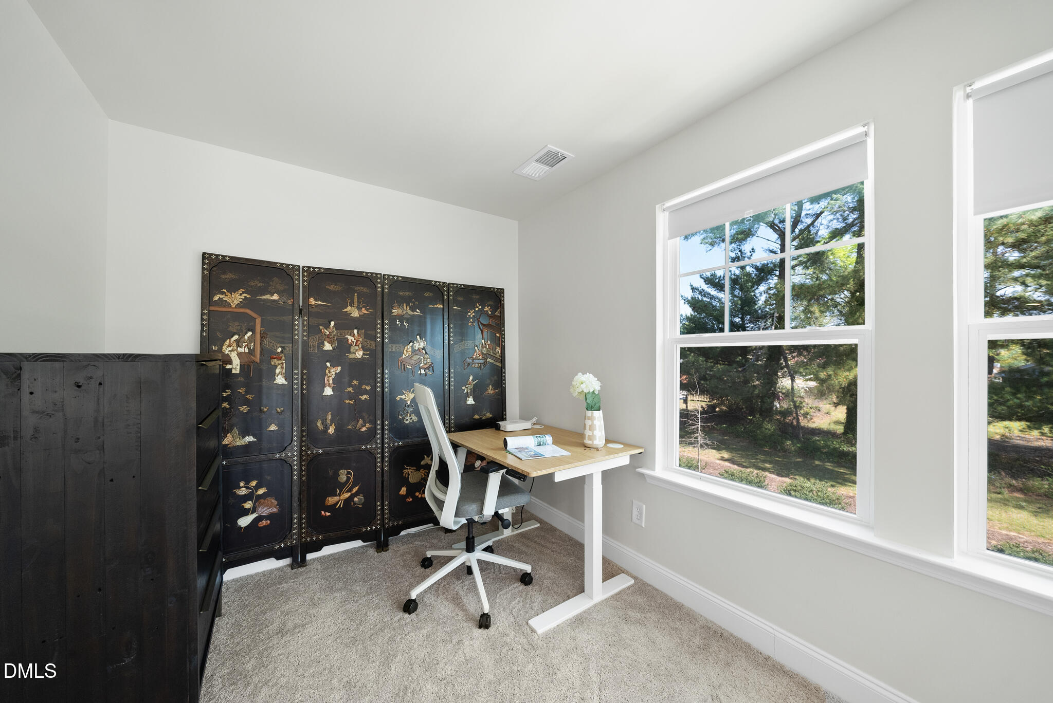 53 Bibury Way Angier, NC 27501 - Photo 27 of 50 a view of a workspace with furniture and a window