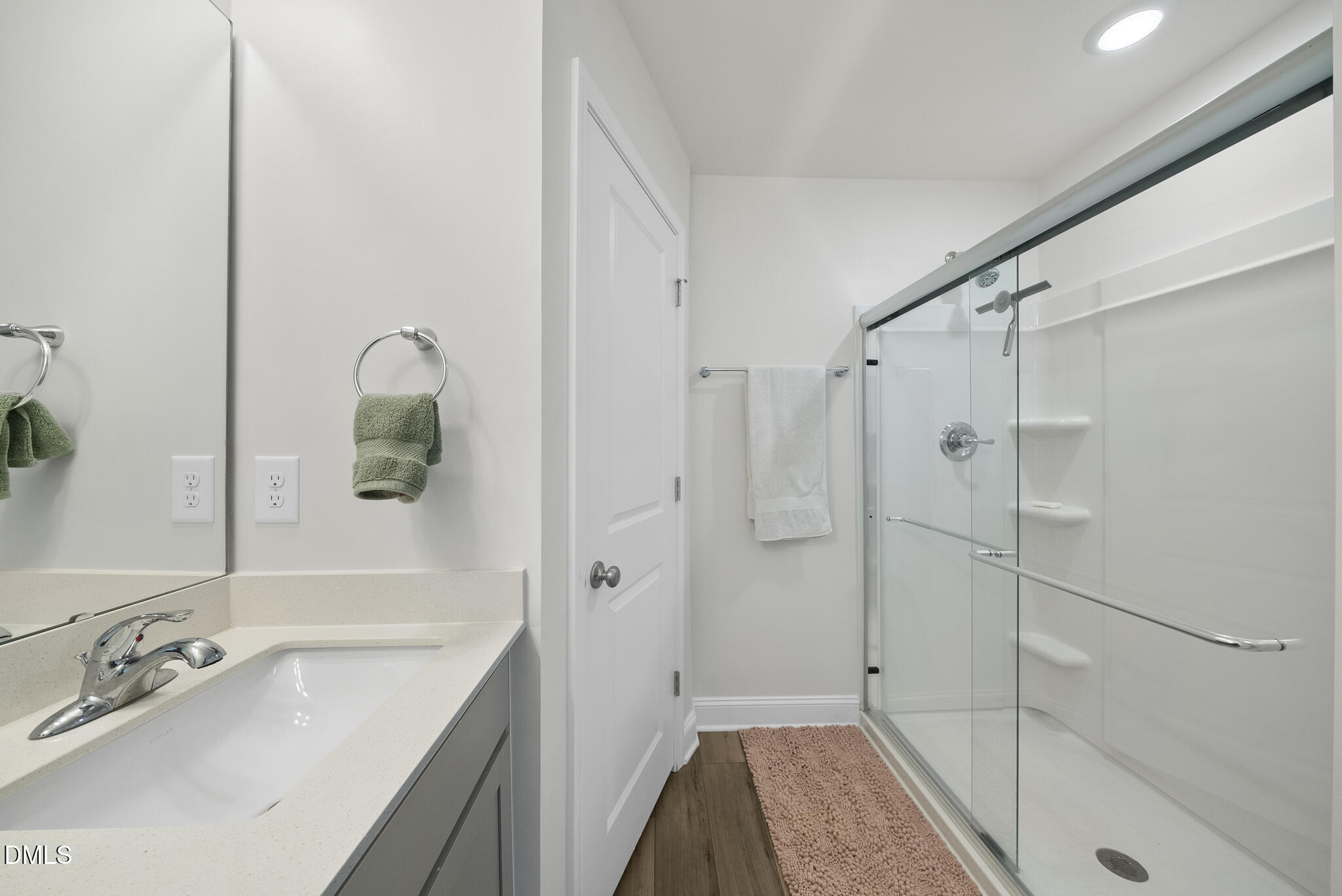 53 Bibury Way Angier, NC 27501 - Photo 30 of 50 a bathroom with a sink and shower