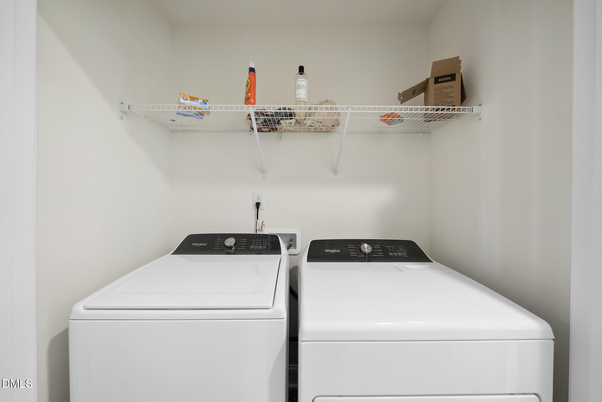 53 Bibury Way Angier, NC 27501 - Photo 31 of 50 a utility room with dryer and washer