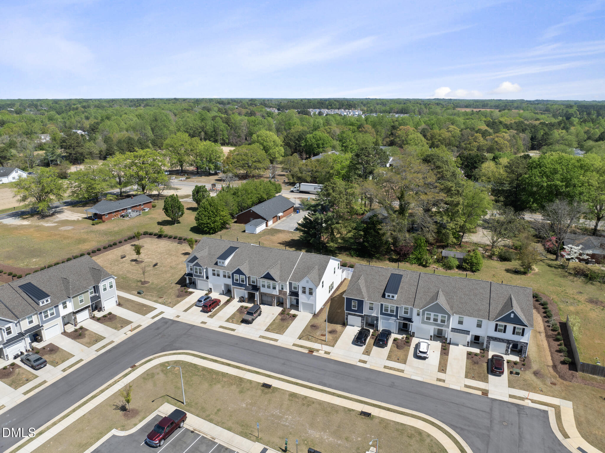 53 Bibury Way Angier, NC 27501 - Photo 40 of 50 a view of a lake with a city