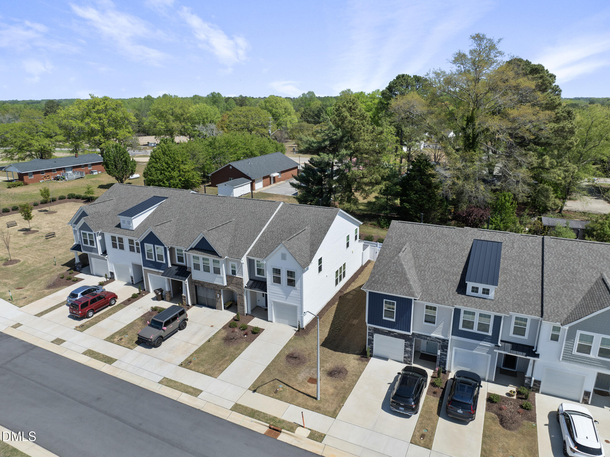 53 Bibury Way Angier, NC 27501 - Photo 41 of 50 an aerial view of residential houses with outdoor space and street view