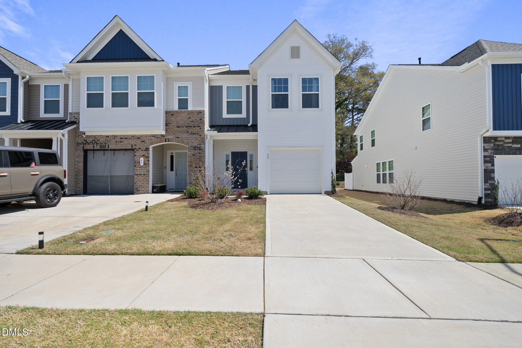 53 Bibury Way Angier, NC 27501 - Photo 42 of 50 a front view of a house with yard