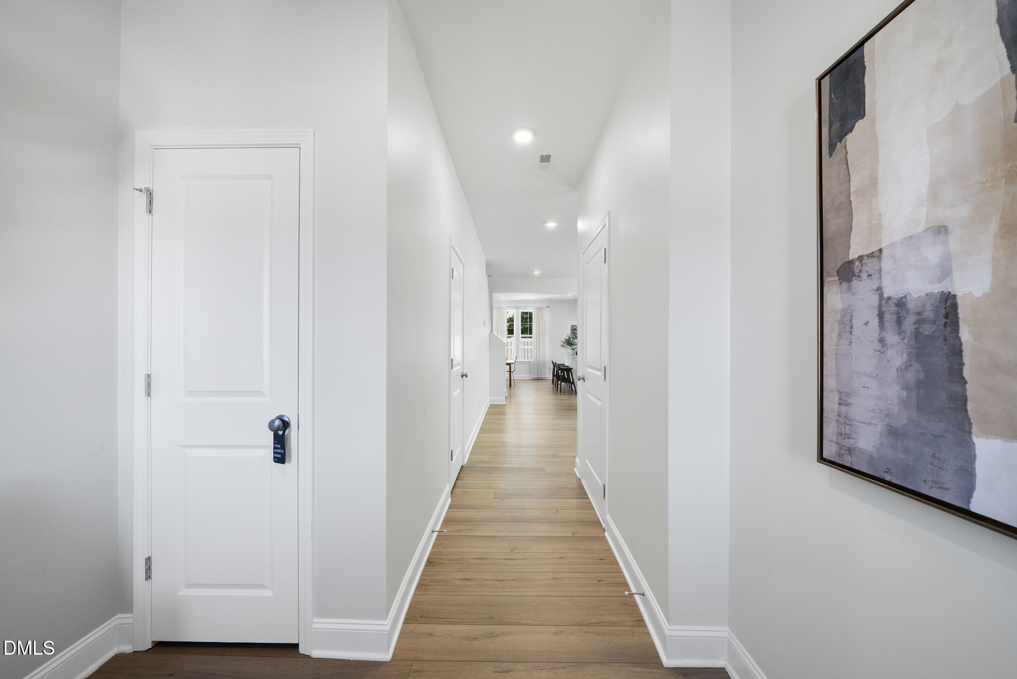 53 Bibury Way Angier, NC 27501 - Photo 3 of 50 a view of a hallway with wooden floor and staircase