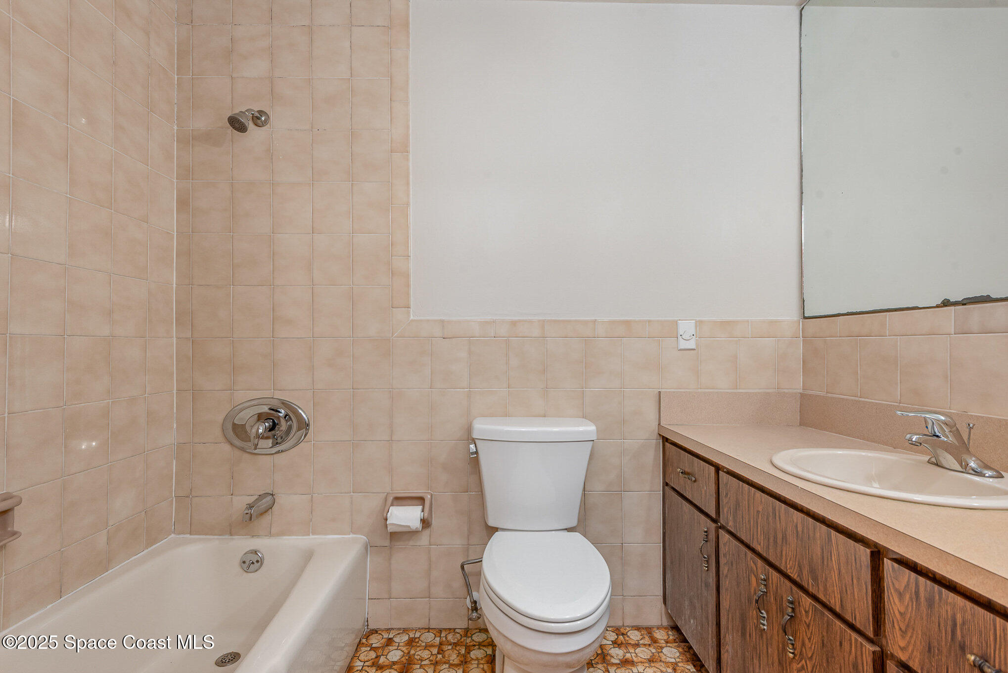 4300 Justa Road Mims, FL 32754 - Photo 20 of 55 a bathroom with a sink toilet and shower