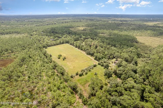 a bathroom with a sink toilet and mirror