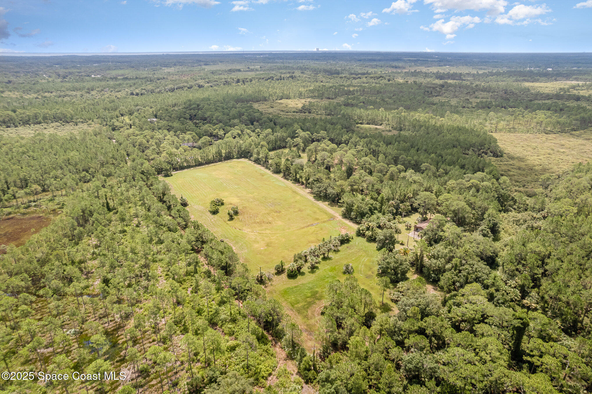 4300 Justa Road Mims, FL 32754 - Photo 50 of 55 a view of a city with an ocean