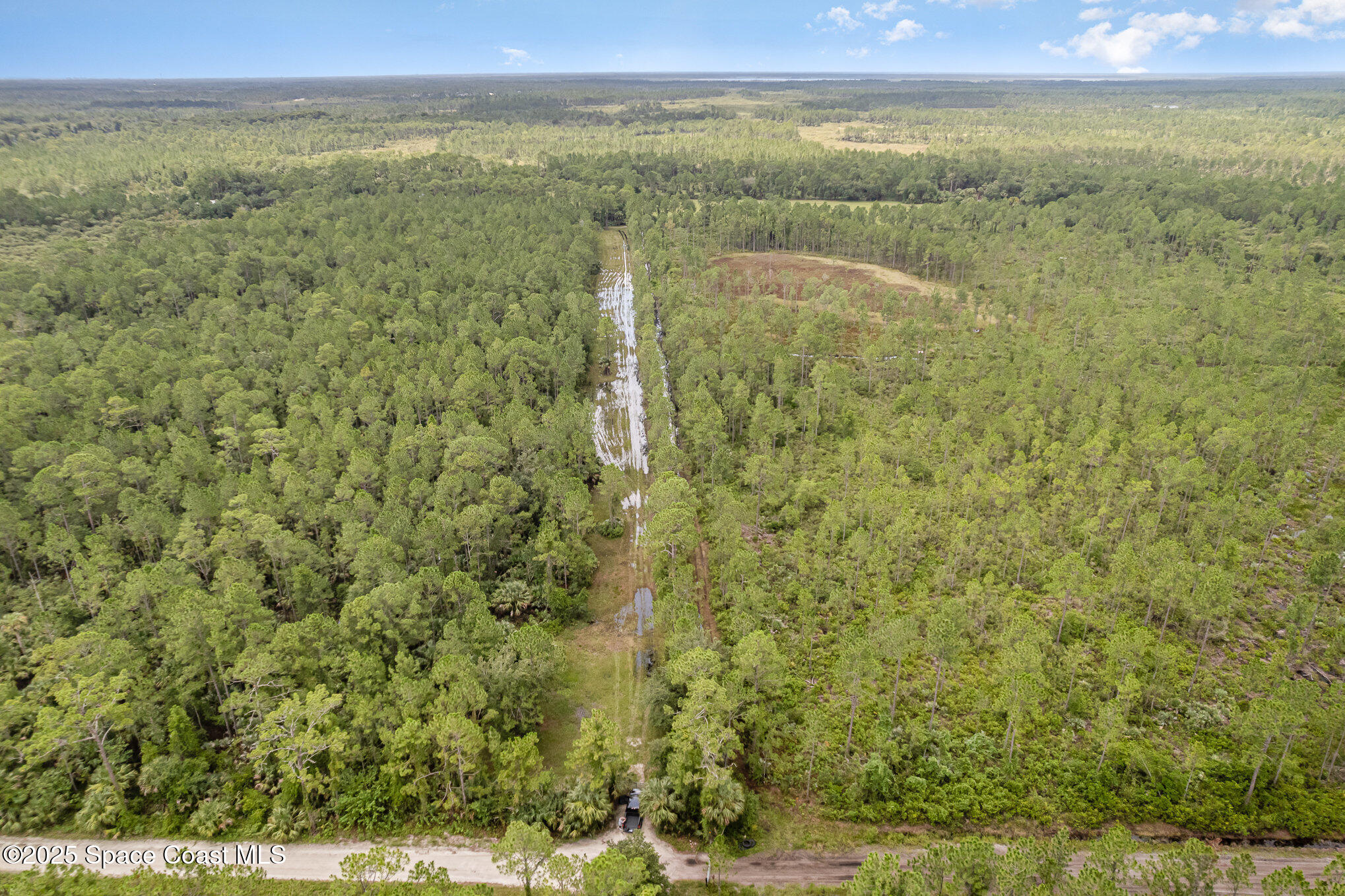 4300 Justa Road Mims, FL 32754 - Photo 52 of 55 a view of a field with an ocean view