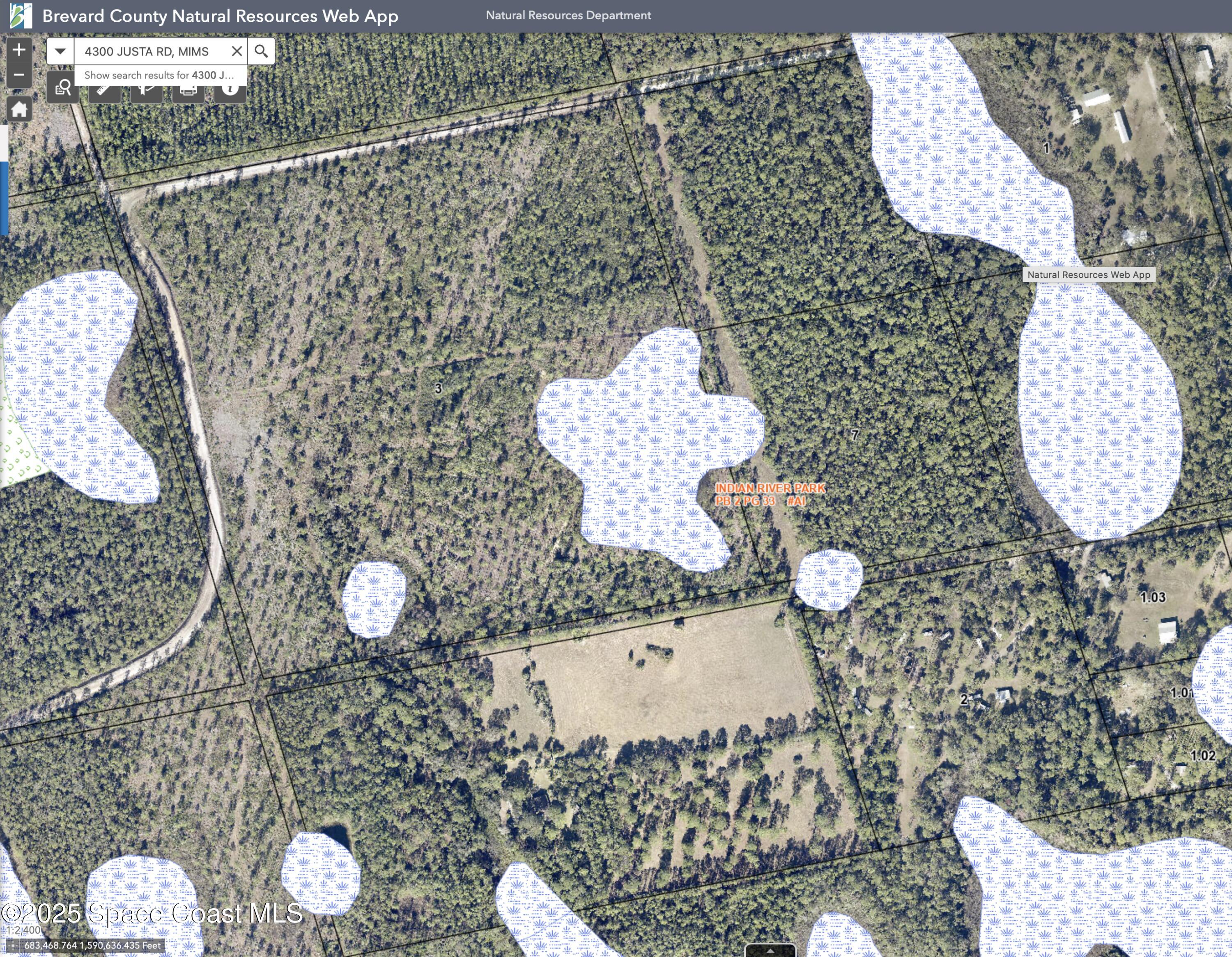 4300 Justa Road Mims, FL 32754 - Photo 54 of 55 a bathroom with a sink toilet and mirror