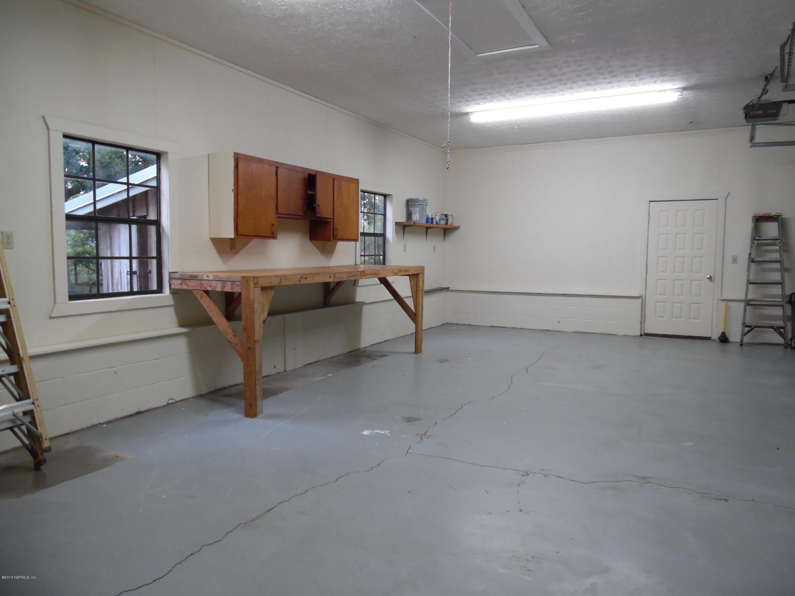 19484 Kenny Conner Road Hilliard, FL 32046 - Photo 18 of 31 WORK BENCH