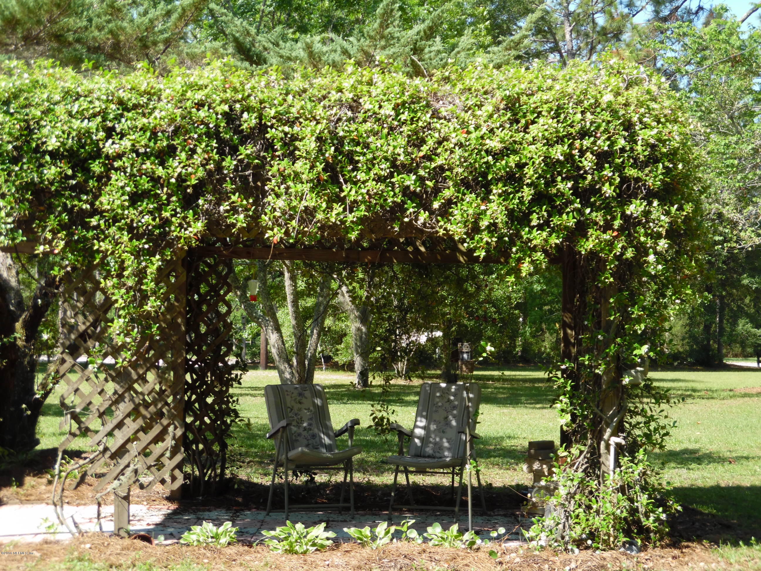 19484 Kenny Conner Road Hilliard, FL 32046 - Photo 23 of 31 SIT AND ENJOY THE JASMINE