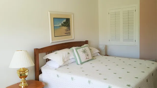 a bathroom with a sink a mirror and a window